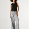 Top in maglia con paillettes Top in maglia con paillettes
