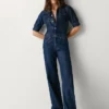 Tuta lunga in denim dalla vestibilità regolare Tuta lunga in denim dalla vestibilità regolare