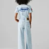 Tuta lunga in denim dalla vestibilità regolare Tuta lunga in denim dalla vestibilità regolare