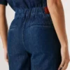 Tuta lunga in denim dalla vestibilità regolare Tuta lunga in denim dalla vestibilità regolare